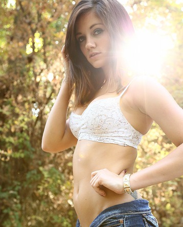 Stella Xo Posing In Her Tight Jeans Shorts In The Forest