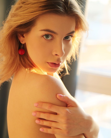 The Sexy Blonde Looks Studious In Her Glasses