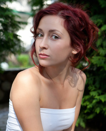 Redhead beauty in the park
