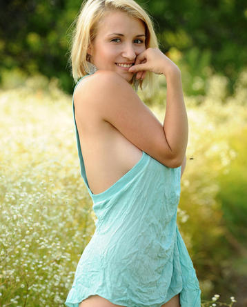 Busty Blond Isabella Posing Outdoors