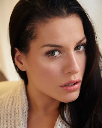 gorgeous long haired brunette smiles