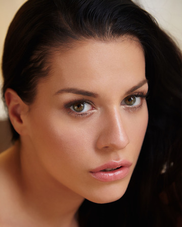 gorgeous long haired brunette smiles